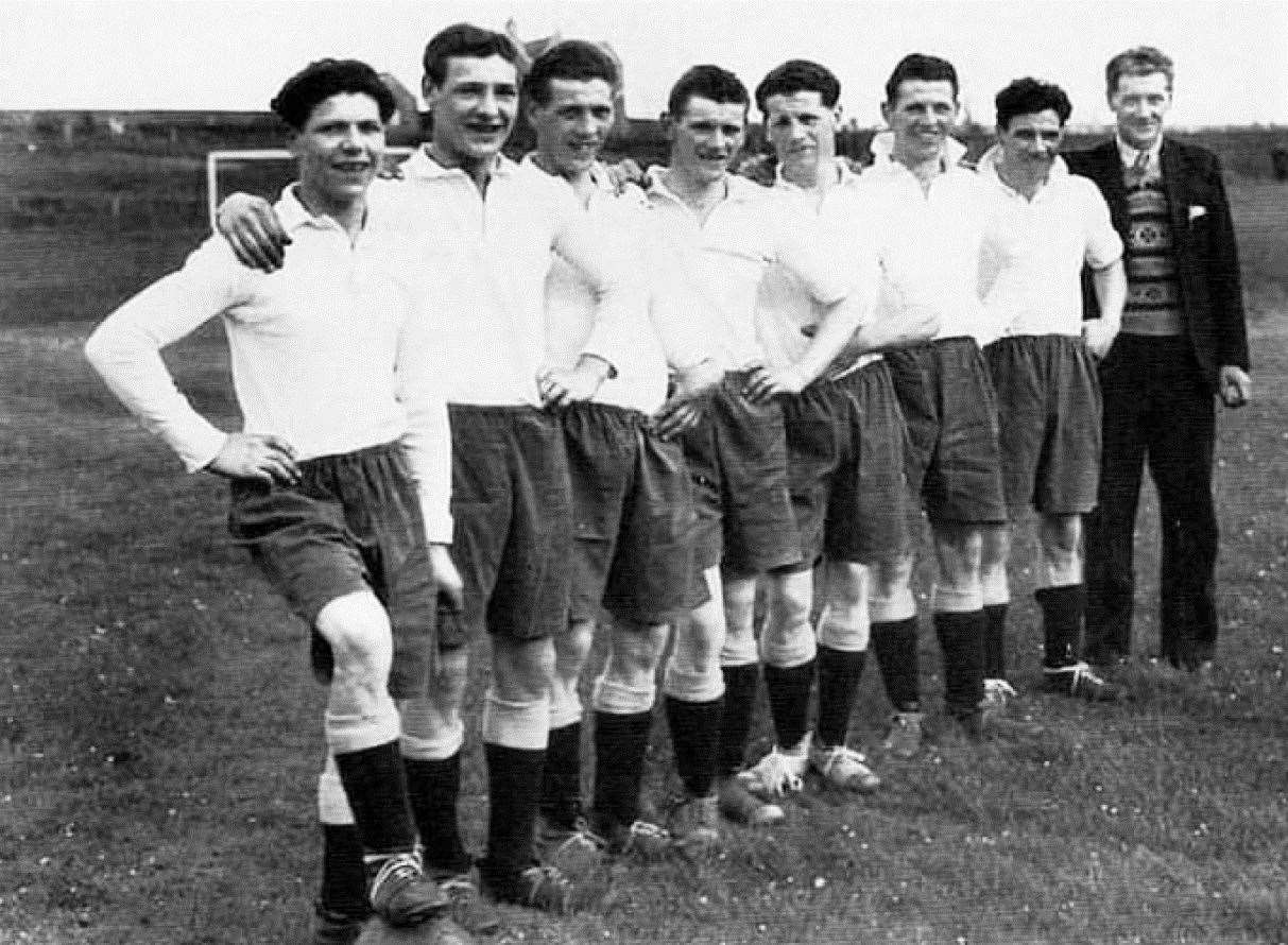 The Larnach footballers in 1952 – (from left) Stanley, David, Sandy, Bill, Eric, Robbie and Jim, with their father, club official Magnus.