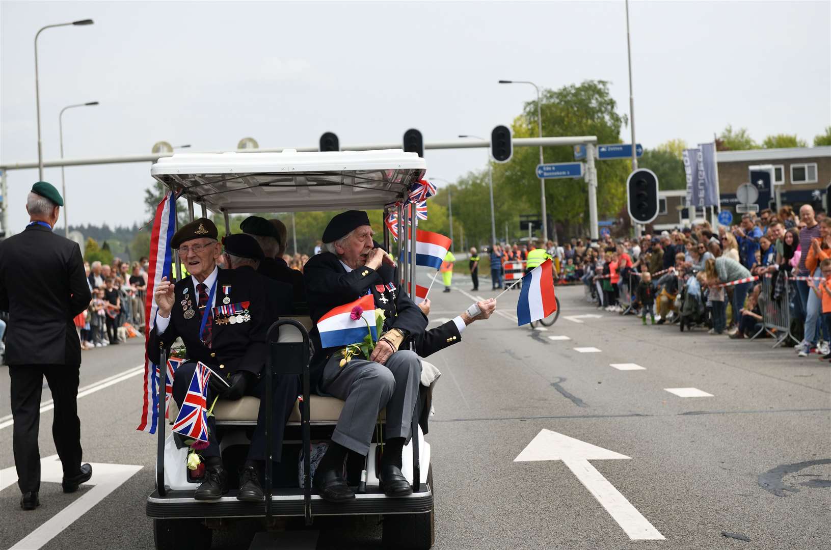 Robbie Larnach (left) in the Netherlands with the Taxi Charity for the Dutch liberation parade last year. The charity says Robbie will be greatly missed by its volunteer drivers and supporters.