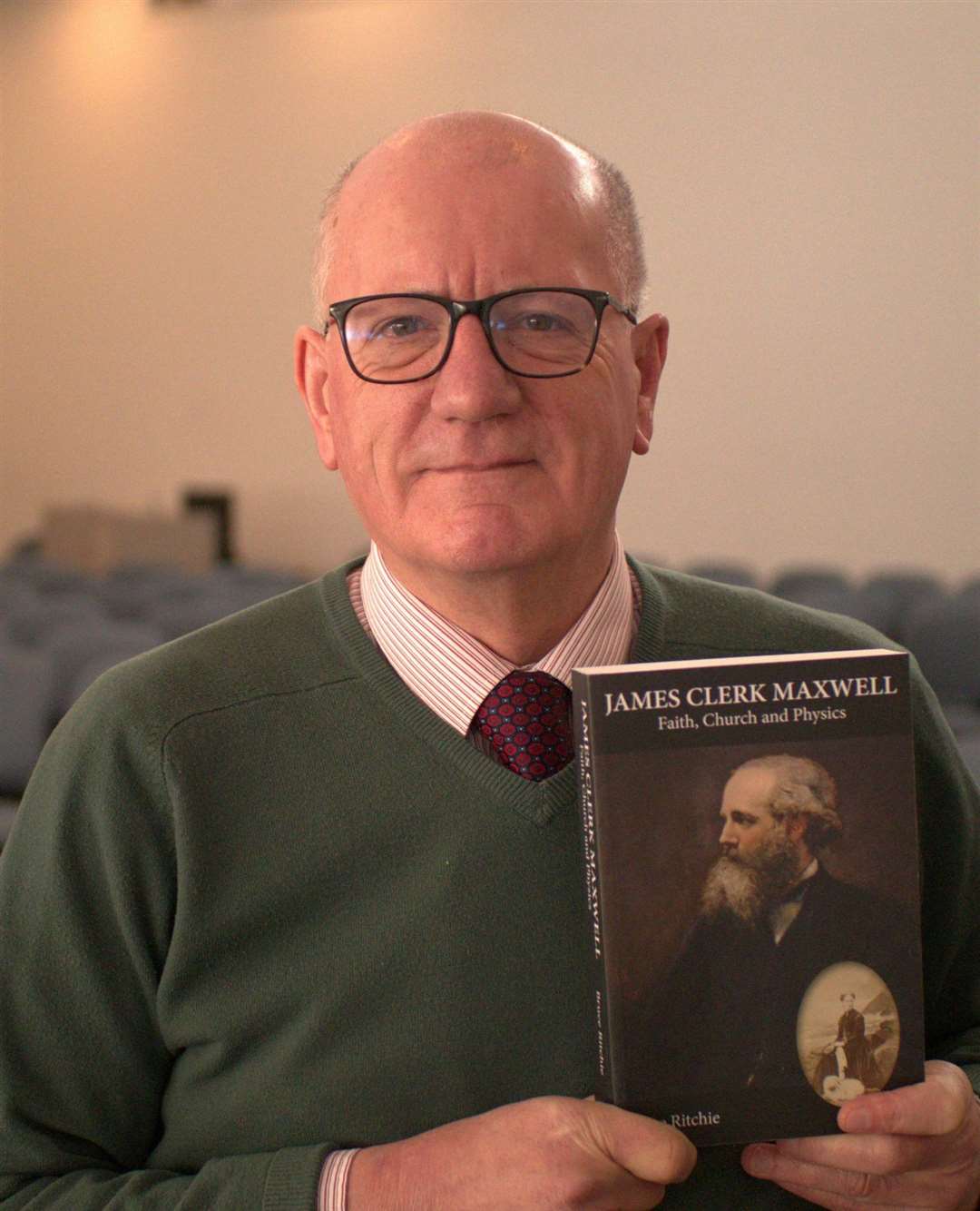 Dr Bruce Ritchie and his new book. Picture: Highland Theological College